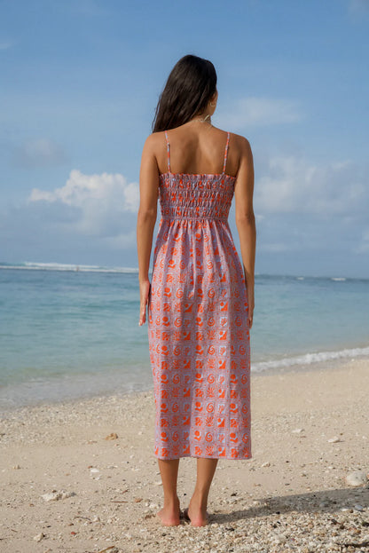 The Stella - Our go-to Summer dress.&nbsp;A flattering and timeless silhouette that seamlessly transitions from day to night. She's a chic and breezy addition to any wardrobe.&nbsp;

A Pops + Co exclusive print. Hand drawn and dyed on 100% Linen.