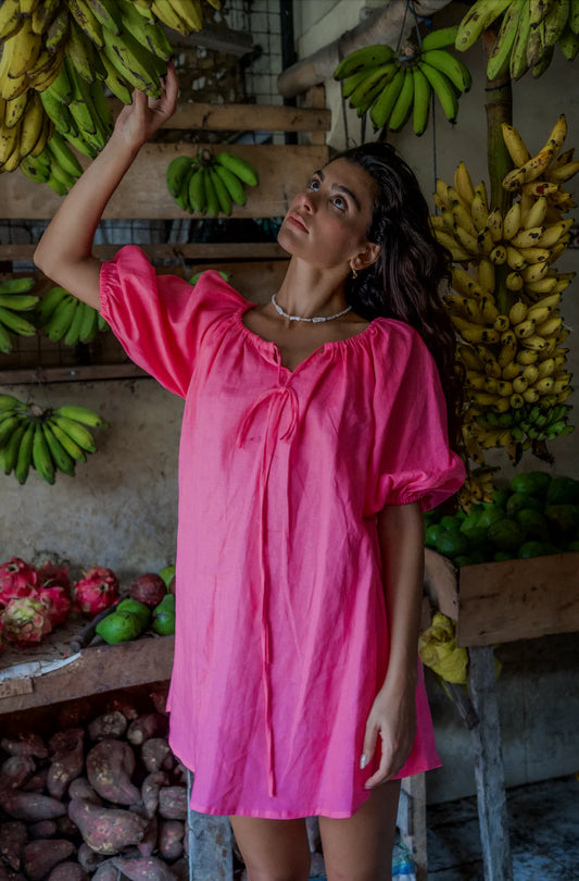 Pops + Co The Lottie - Fun and flirty with her blousen sleeves and smock silhouette - With the elasticised neckline this style can be worn comfortably both on and off the shoulders. She's an easy wearing style that will take you through all the seasons.&nbsp;

Hand dyed&nbsp;on 100% Linen.