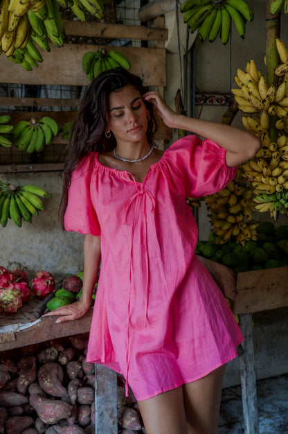 Pops + Co The Lottie - Fun and flirty with her blousen sleeves and smock silhouette - With the elasticised neckline this style can be worn comfortably both on and off the shoulders. She's an easy wearing style that will take you through all the seasons.&nbsp;

Hand dyed&nbsp;on 100% Linen.