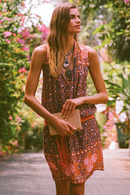 Our Love Jetty Sleeveless Tunic Dress in Balmy Nights is a Spell favourite style reimagined in dreamy deep hues spliced together with striking border details and rambling floral print. An easy throw on piece, our tunic is light and breezy featuring neck ties with tassels for some 70’s bohemian charm. Style with boots and a white blouse layered underneath or over your favourite denim with beads and bangles, the possibilities are endless!