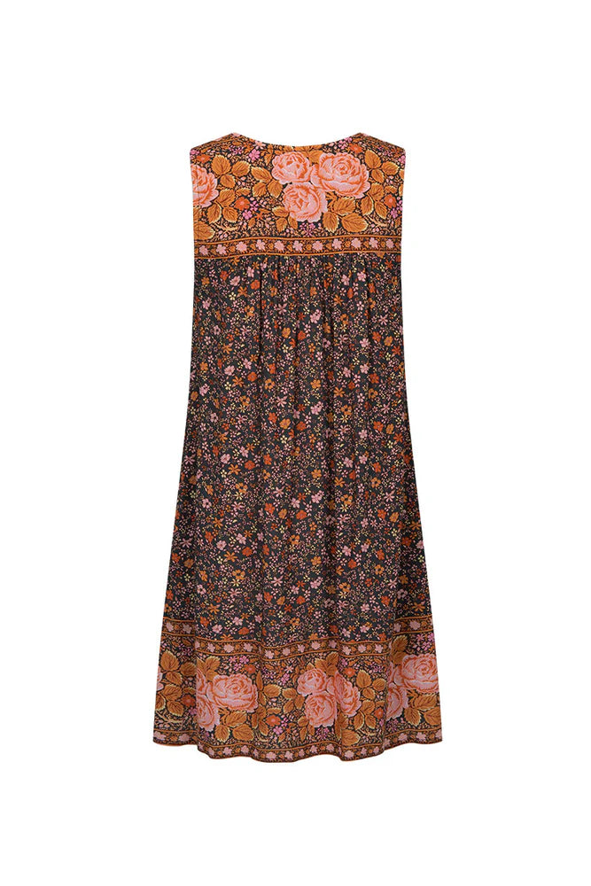 Our Love Jetty Sleeveless Tunic Dress in Balmy Nights is a Spell favourite style reimagined in dreamy deep hues spliced together with striking border details and rambling floral print. An easy throw on piece, our tunic is light and breezy featuring neck ties with tassels for some 70’s bohemian charm. Style with boots and a white blouse layered underneath or over your favourite denim with beads and bangles, the possibilities are endless!