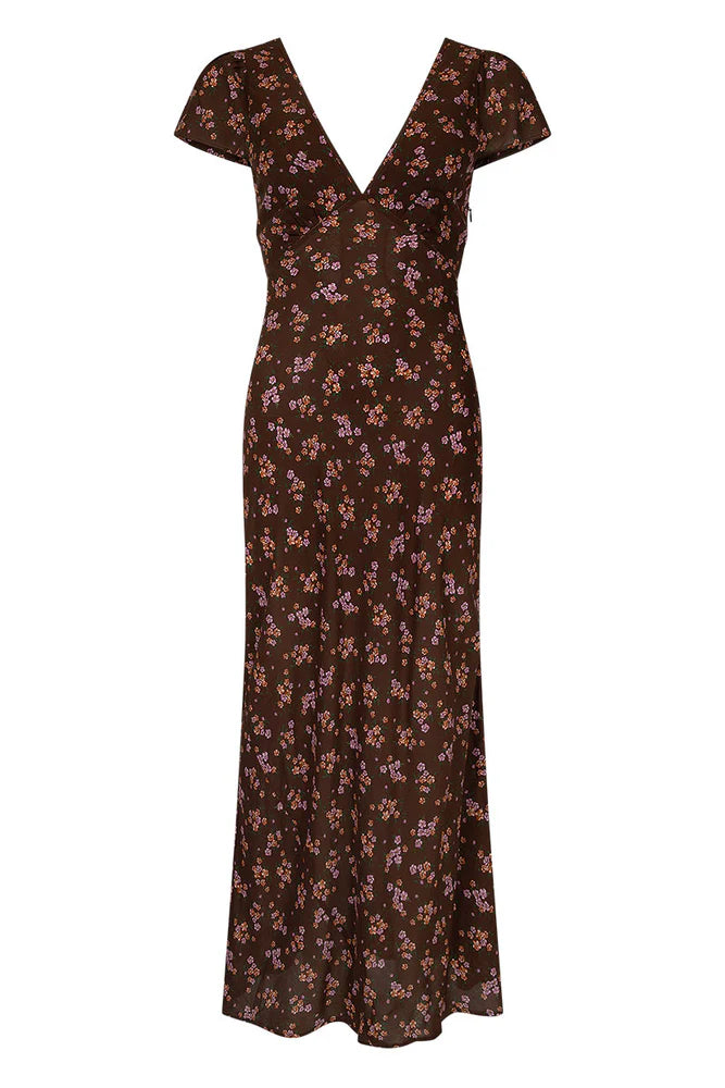 Our Melody Bias Maxi Dress in Antique Walnut is crafted for the heartbreakers. An exquisite showstopper, our dress is cut to flatter the waist and glide over the hips accentuating your silhouette. Soft pink ditsy florals ramble across a backdrop of deep chocolate brown, flutter sleeves float sweetly at the shoulder and the V neckline and low V back adds a sensual touch. Pair with mules and fine jewels for date night or with combat boots and a slouch bag for something a little more rock and roll.