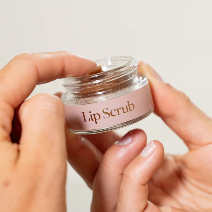 Reveal softer, healthier lips with our natural Lip Scrub. Fine coconut sugar gently exfoliates dry flakes while nourishing castor oil provide deep hydration for dry, chapped lips. Our Australian-made lip scrub combines pure beeswax and carnauba wax to create a protective moisture barrier against harsh weather while the antioxidant-rich Vitamin E shields from environmental damage and supports lip repair. Embrace this mindful self-care ritual before applying balm or lipstick for a smooth, nourished pout. Oh a