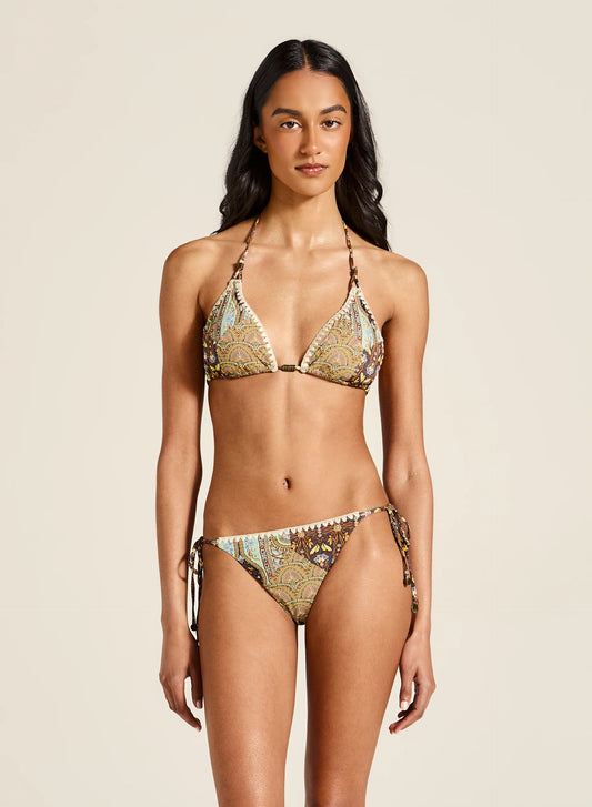 This timeless triangle shape is elevated with stunning custom patchwork details, infusing a unique feel into a beloved design. The feature blanket stitch and metal charms add a special touch, creating you the perfect statement swim style.