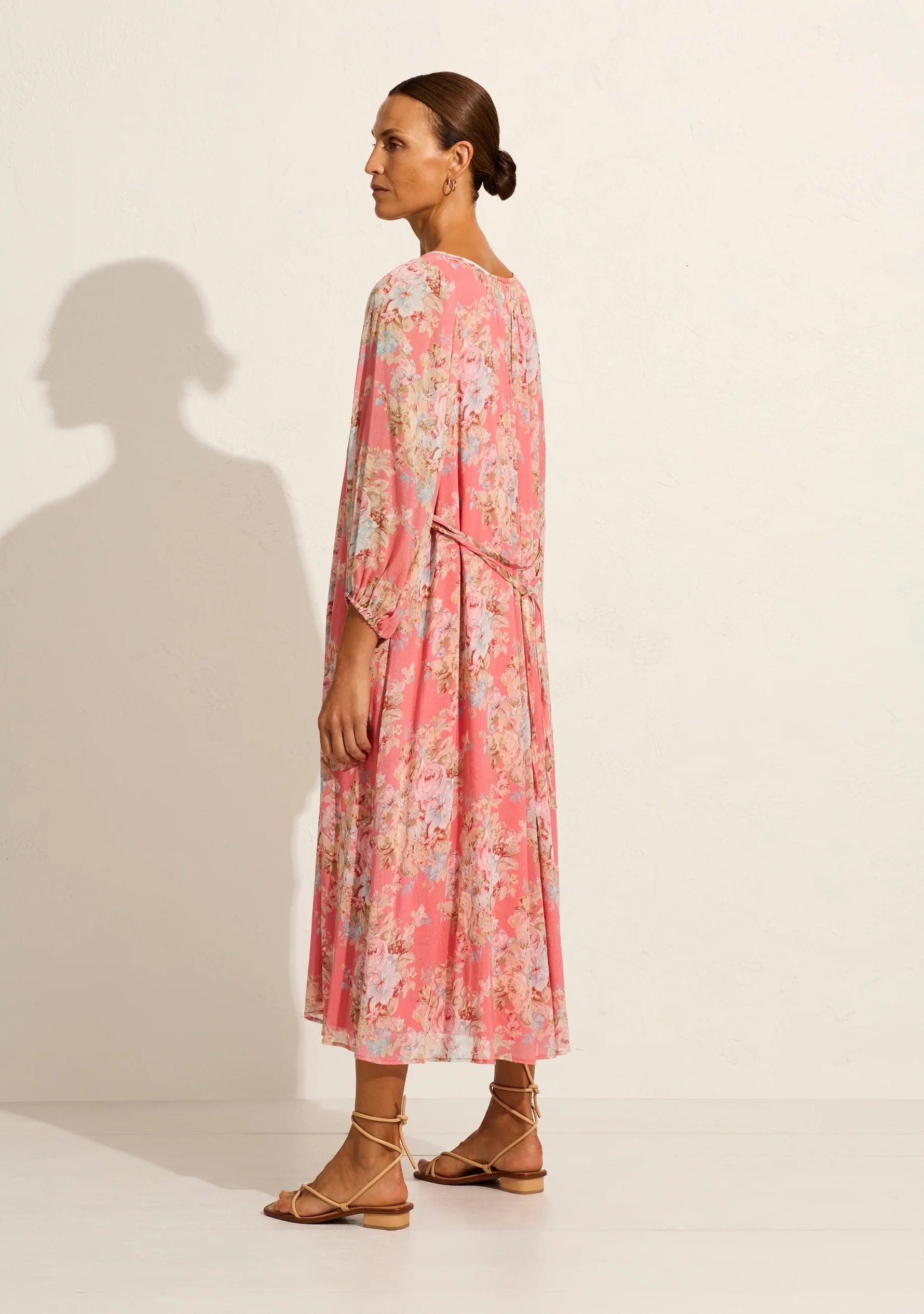 The Willow midi dress in our Bijoux floral in rose pink epitomises quintessential Auguste with its relaxed, floaty silhouette. It features an optional open-close neckline with tie detail, 3/4 elasticated sleeves, and an optional waist tie. Crafted from a silky cotton blend with a soft hand feel, it's an Auguste bestseller.