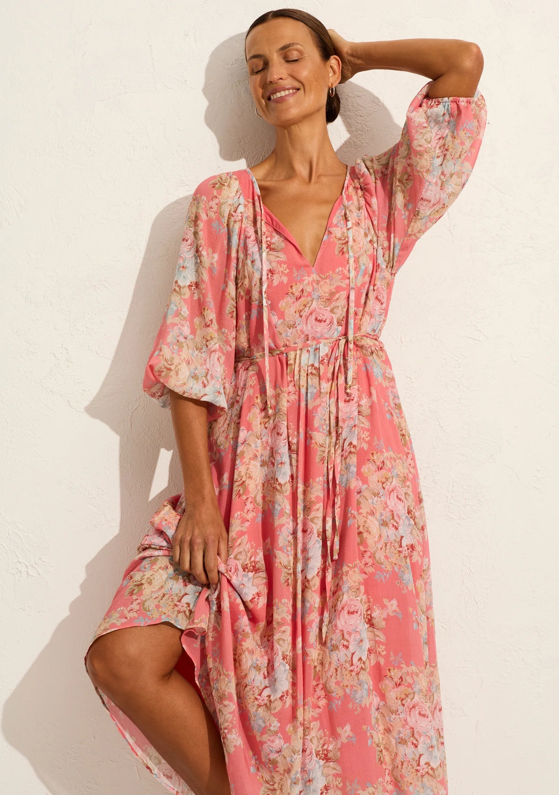 The Willow midi dress in our Bijoux floral in rose pink epitomises quintessential Auguste with its relaxed, floaty silhouette. It features an optional open-close neckline with tie detail, 3/4 elasticated sleeves, and an optional waist tie. Crafted from a silky cotton blend with a soft hand feel, it's an Auguste bestseller.