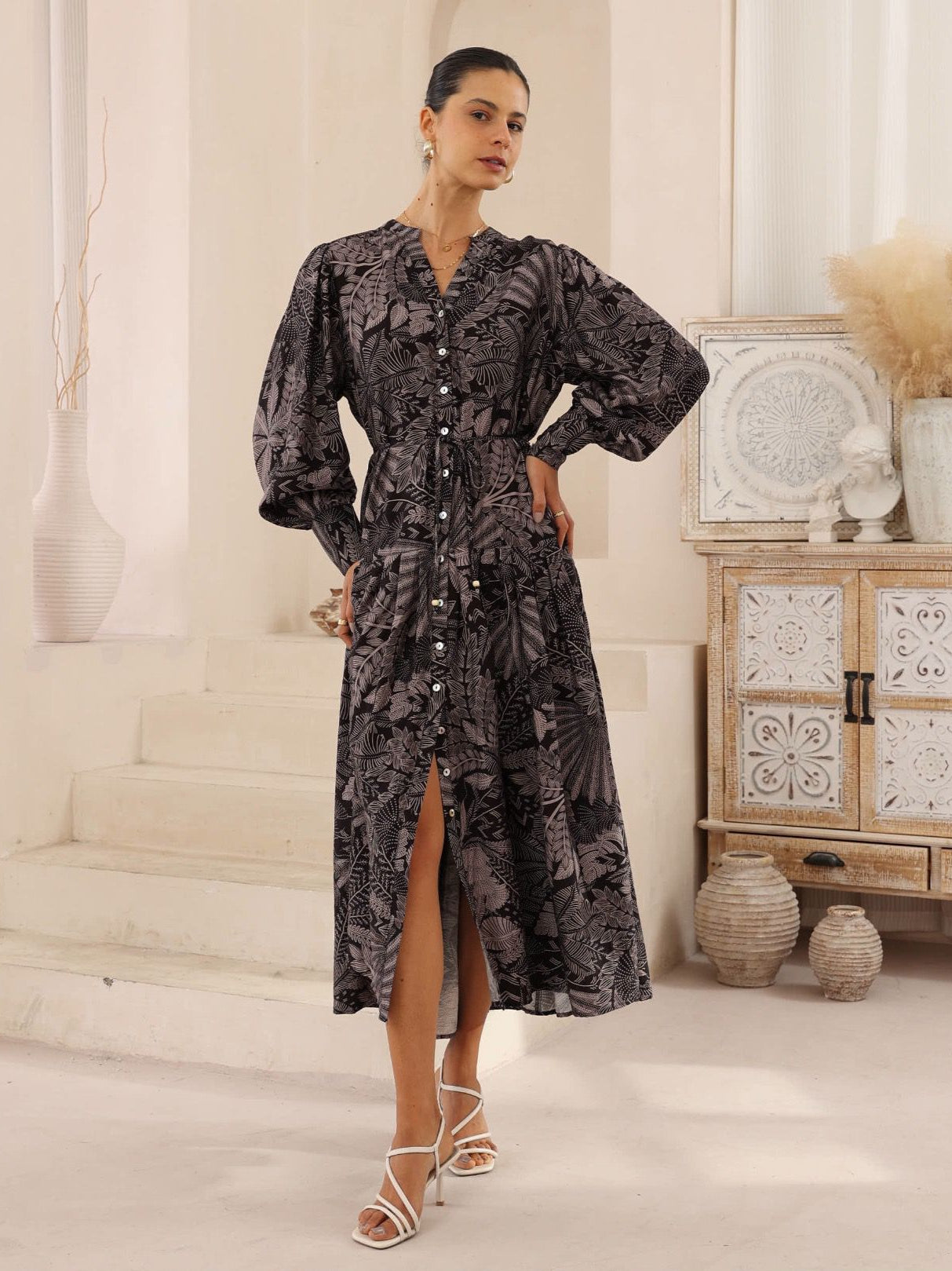 Elegant. Feminine. Effortlessly chic. The Palm Maxi Dress&nbsp;in an exclusive tropical noir print redefines laid-back luxury. Crafted with a premium blend of rayon, linen, and viscose, this dress brings breathability, texture, and fluid drape—perfect for balmy days or dressed-up evenings.