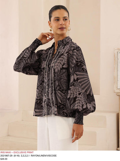 Elevate your wardrobe with the sophisticated charm of the Palm Shirt, featuring a luxurious, nature-inspired exclusive print. This blouse is designed for women who embrace elegance, comfort, and individuality in one seamless look.
