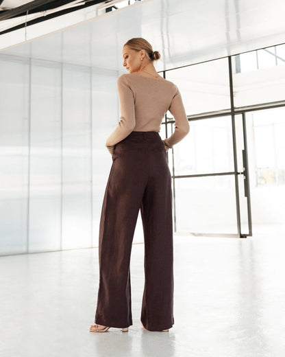 Effortless flow. Elevated comfort.
The Castaway Pants are designed with a high-rise waist and a wide-leg silhouette, offering a relaxed yet refined fit. Crafted from lightweight, breathable fabric, they drape beautifully for all-day ease. Perfectly tailored with side pockets and a flattering length, these pants transition seamlessly from casual days to polished evenings.