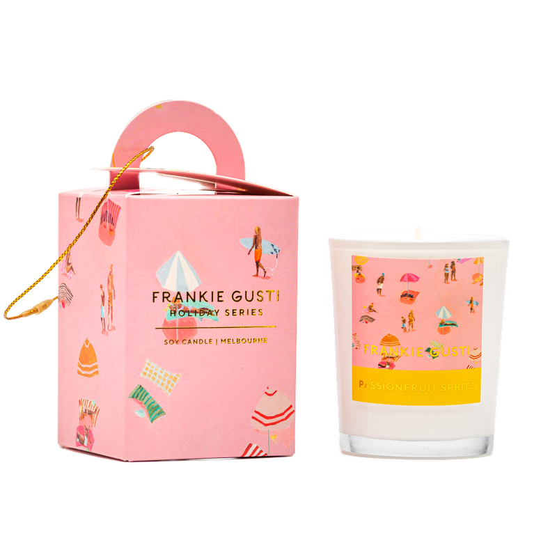 Bring the sunshine in with the Holiday Series Ornament Candle in Passionfruit Spritz by Frankie Gusti x Janey Forbes. A celebration of summer, this soy candle bursts with juicy passionfruit and zesty citrus, balanced by hints of sparkling prosecco and sweet peach nectar.

Housed in a reusable glass vessel and packaged in a limited-edition illustrated box by artist Janey Forbes, it captures the playful nostalgia of an endless beach holiday — think balmy nights, salty skin, and a spritz in hand.