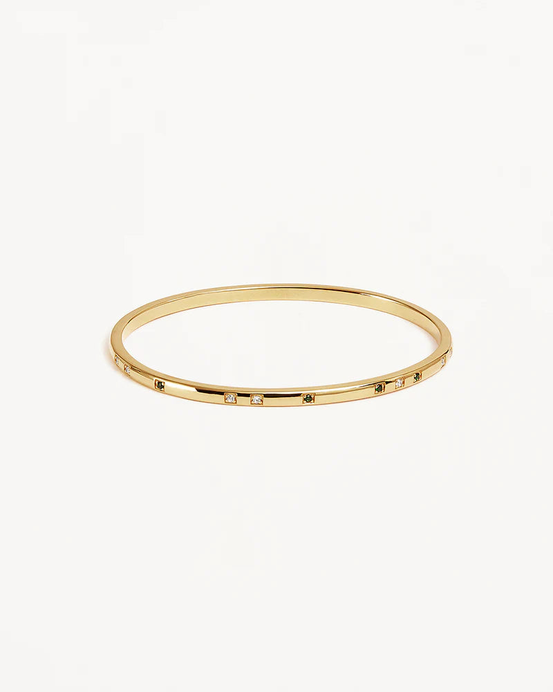 Our&nbsp;18k Gold Vermeil Depth of You Bangle&nbsp;draws inspiration from the profound depths of the sea, bringing a sense of calm as you look inward.&nbsp;Featuring a polished finish and encrusted with white and green&nbsp;cubic zirconia crystals&nbsp;in claw settings, this radiant bangle is&nbsp;the perfect eclectic addition to your bracelet stack.&nbsp; &nbsp;