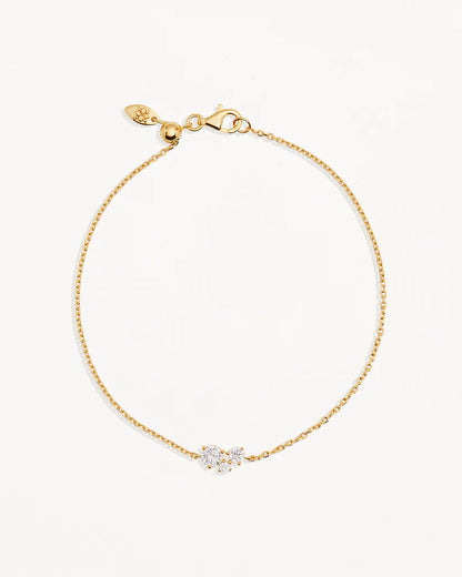 The&nbsp;Whispers of Love&nbsp;Bracelet&nbsp;features a classic trio design with an asymmetrical twist with varying sizes of round-cut crystals. This piece is a visual poem to the simplicity of love - and all the quiet magic it holds.&nbsp;It’s&nbsp;classic and delicate design is the perfect subtle touch of sparkle for the bride looking to shine in her own light.&nbsp;&nbsp;&nbsp;

Available in 18k gold vermeil and sterling silver.&nbsp;

2.5 microns of 18 carat gold coating a sterling silver base.&nbsp;