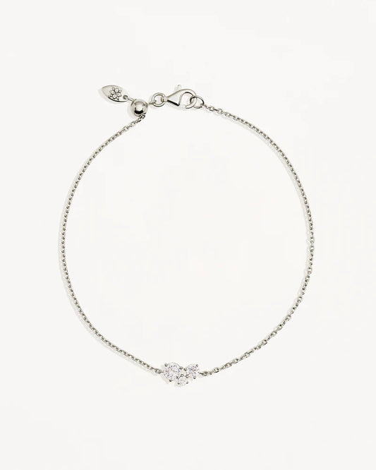 The&nbsp;Whispers of Love&nbsp;Bracelet&nbsp;features a classic trio design with an asymmetrical twist with varying sizes of round-cut crystals. This piece is a visual poem to the simplicity of love - and all the quiet magic it holds.&nbsp;It’s&nbsp;classic and delicate design is the perfect subtle touch of sparkle for the bride looking to shine in her own light.&nbsp;&nbsp;