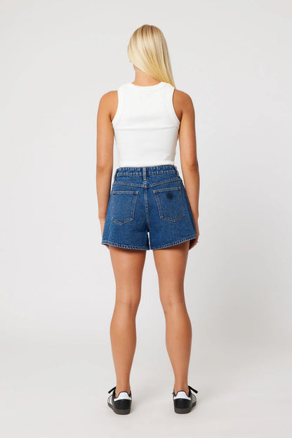 High rise, loose fit short
Inleg Length: 10cm
Bella is a mid blue stone-washed colour inspired by 90's denim
Finished with faded tobacco stitching, silver trims & black patch
Crafted with a comfort rigid denim meaning they will be fitted when first worn and will slowly soften & mold to your body after wash & wear
Zip fly
Made with 91% cotton, 5% viscose & 4% polyester