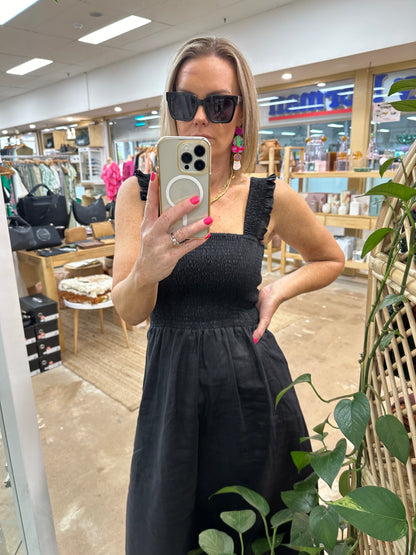 Goldie Dress by pops + Co is the perfect little black dress. Can be dressed up or down for any occasion. 100% linen, midi length, sheered bodest with thrill sleeve.