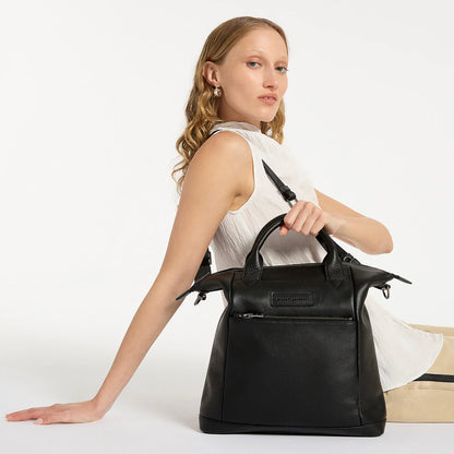 Made in response to the (very) popular request to make a smaller size version of our best selling 'Comes In Waves' bag. Mini Waves is the perfect uni or work bag with a wide opening top, space for your laptop and multiple compartments to keep everything in its place. Carry in hand with the top straps, over the body with the long webbed strap (included), or on your back with the shoulder straps. Big enough to carry everything you need, not too big to slow you down.&nbsp;