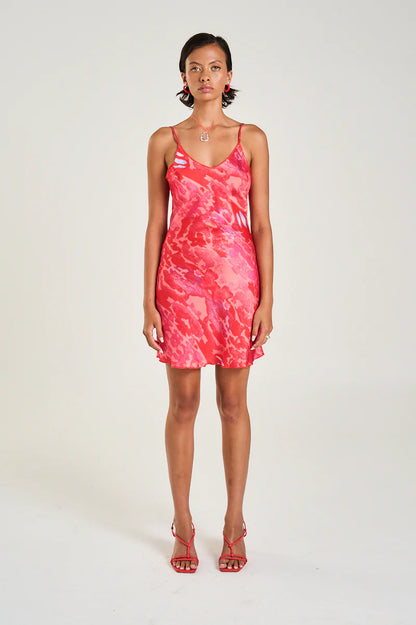 The Siren Mini Dress in Cycloid is a classic and timeless design with a V-neckline and adjustable straps falling elegantly just above the knee line.