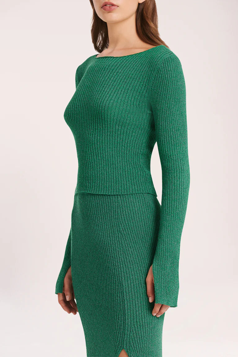 The Dune Long Sleeve Knit is made in a lightweight, textured knit with a dry handfeel quality. The silhouette is a flattering close fit. Features include a crew neck, long fitted sleeves, and length finishing at the hip. Try styling with the Dune Knit Pant or Dune Knit Skirt for a coordinated look.