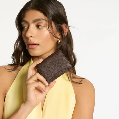 With her compact profile, 'Lumen' will carry all your essentials and still be able to slip into your pocket or the side pocket of your bag. Genius.