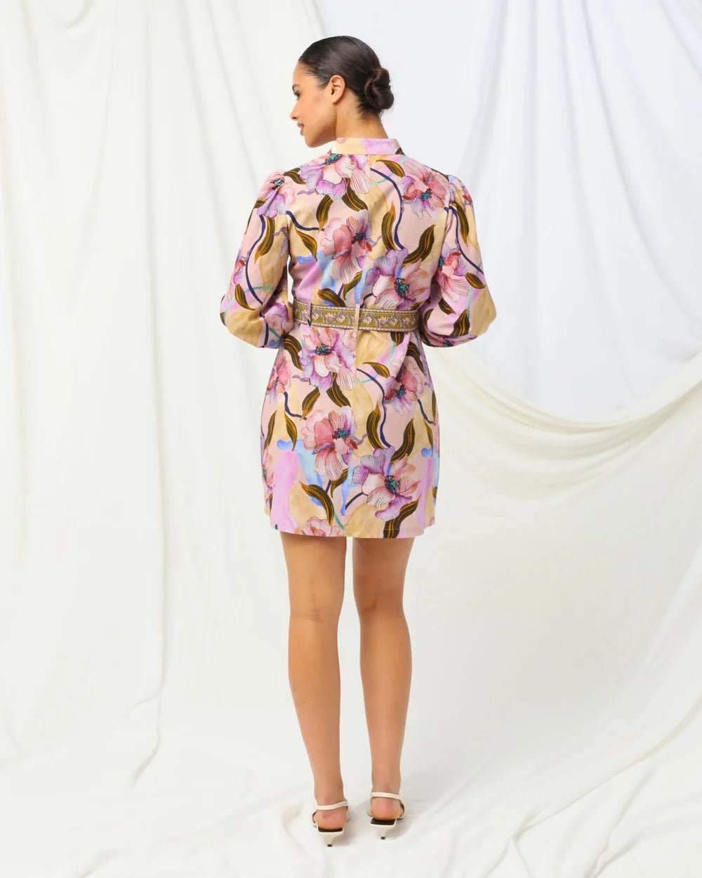 Cute, sassy, and guaranteed to turn heads - the Lucia Mini Dress by Kachel is a total standout.