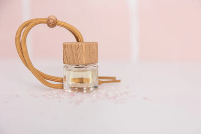 Enjoy your favourite Laced with Kindness candle scents on the go. Freshen up your car, caravan, wardrobe, or favourite space with our car diffuser collection that contains a few of our best selling blends. 

Feel fresh, healed, and relaxed on the road wherever you go. 

Available in Balance, Healing, Love, and Protection. Each is infused with crystals for extra healing properties. 

Size: 4.5cm x 2cm x 2cm