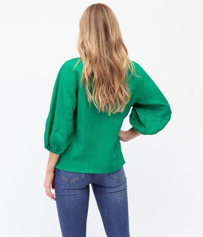 The Elsa top by Label of Love in Emerald Green features bellowed sleeves, loose fit and elongated length.