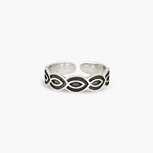 Introducing our Intertwine Toe Ring, a beautifully crafted piece made from sterling silver featuring an elegant woven pattern. This fully adjustable design allows it to be worn as either a toe ring or a regular ring, offering versatility and style. Perfect for adding a touch of intricate charm to any look, the Intertwine Toe Ring is a timeless accessory for any jewellery collection.