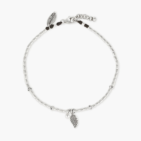 Embark on a dreamy island adventure with our Island Dreaming Anklet. Handcrafted with love, this anklet features Hill Tribe Silver beads and charms that exude bohemian charm and coastal elegance. The Polywax cotton cord adds a touch of natural texture, while the Sterling Silver clasp and adjustable link ensure a secure and comfortable fit. Let the Island Dreaming Anklet be a reminder of carefree days and the beauty of island living.