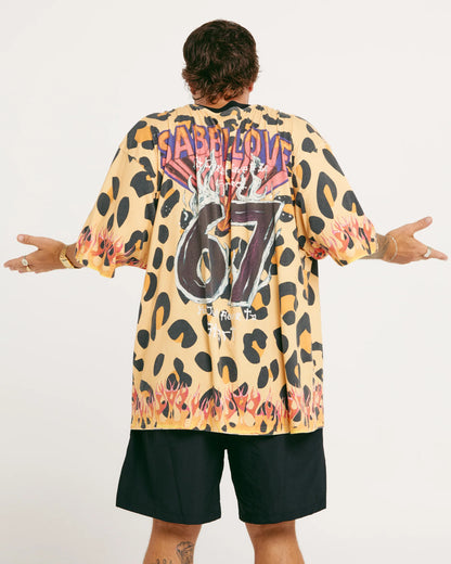 The Very Oversized 67 Tee

Turn heads, start conversations and spark a little chaos - The Very Oversized 67 Tee is here to steal the damn show.

This standard cut tee drips with nostalgia: think vintage gig-poster graphics, leopard print for days, and a lick of flames because… why the hell not?