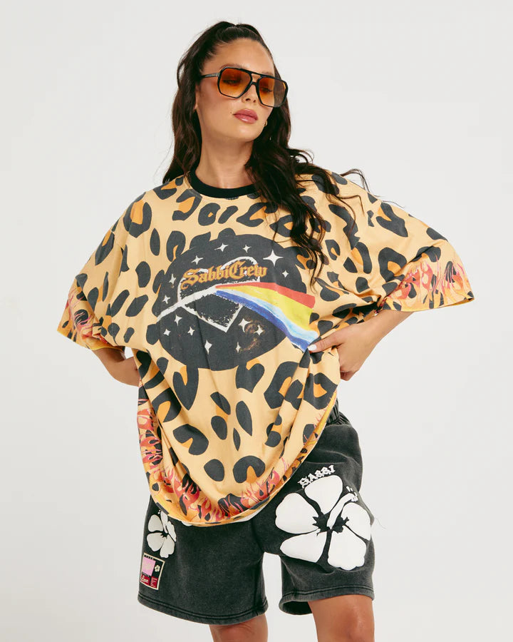 The Very Oversized 67 Tee

Turn heads, start conversations and spark a little chaos - The Very Oversized 67 Tee is here to steal the damn show.

This standard cut tee drips with nostalgia: think vintage gig-poster graphics, leopard print for days, and a lick of flames because… why the hell not?