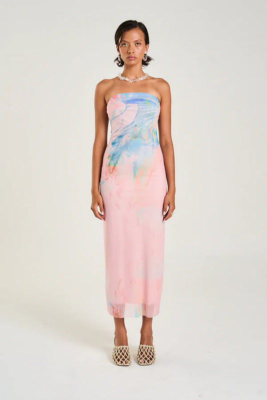 The strapless slip dress showcasing the Medusa Phase print in soft pastel hues features a form-fitting design with a double layered construction. It provides medium to sheer coverage and a flattering silhouette.

