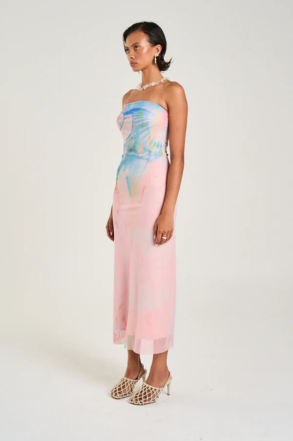 The strapless slip dress showcasing the Medusa Phase print in soft pastel hues features a form-fitting design with a double layered construction. It provides medium to sheer coverage and a flattering silhouette.

