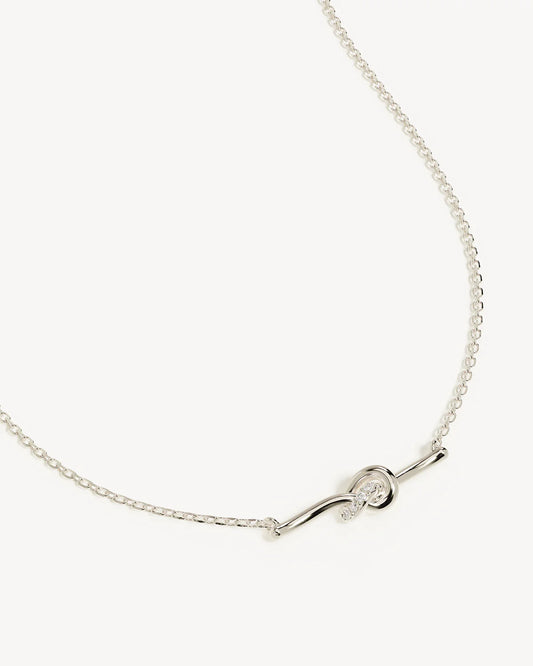 Our&nbsp;Sterling&nbsp;Silver Love Knot&nbsp;Lab-Grown&nbsp;Diamond Necklace&nbsp;serves as a&nbsp;delicate reminder of unbreakable bonds and the cherished connections that shape our lives.&nbsp;This delicate knot-bar necklace is adorned with ethically sourced GH-SI lab-grown diamonds in a pavé setting. Fixed on our signature fine chain, this keepsake will be cherished forever.&nbsp;Available in 18k gold vermeil and&nbsp;925&nbsp;sterling&nbsp;silver.&nbsp;&nbsp; &nbsp;