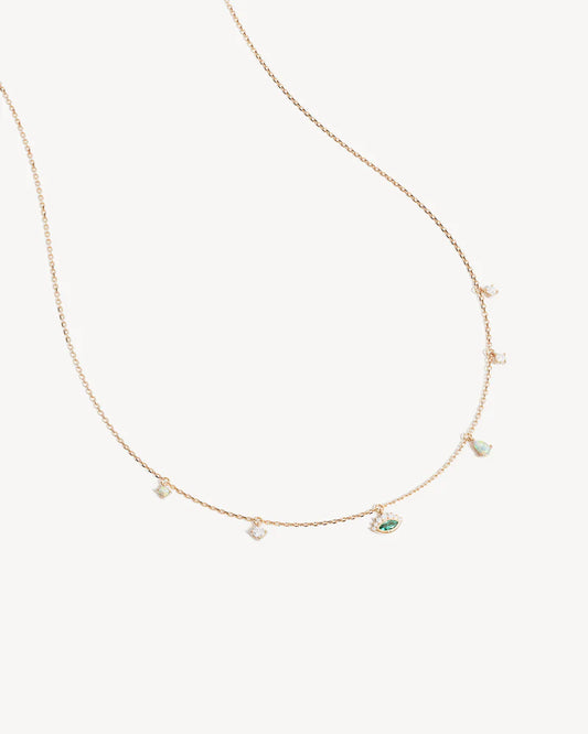 Breathe new life into the new year&nbsp;with the&nbsp;Hope and Protection&nbsp;Necklace.&nbsp;Set with&nbsp;lab-grown&nbsp;opals and&nbsp;lab-grown blue Paraiba marquise-cut gemstone,&nbsp;our luminous evil&nbsp;eye&nbsp;will&nbsp;assist&nbsp;you in shedding all that does not serve you, allowing you to move into the new year with purpose and peace.&nbsp;This keepsake is perfect for gifting,&nbsp;traditionally gifted to imbue the wearer with luck and protection.&nbsp;