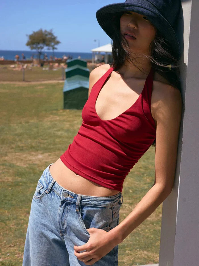 The Kyah Halter Top is a classic halter neck tank made in a super soft jersey fabrication. It features flattering gathered side seams and a low V neckline. There is an adjustable lingerie elastic across the back for support and is fully lined. We thought of everything with the Kyah making it an elevated essential piece for every Ownley girls wardrobe.