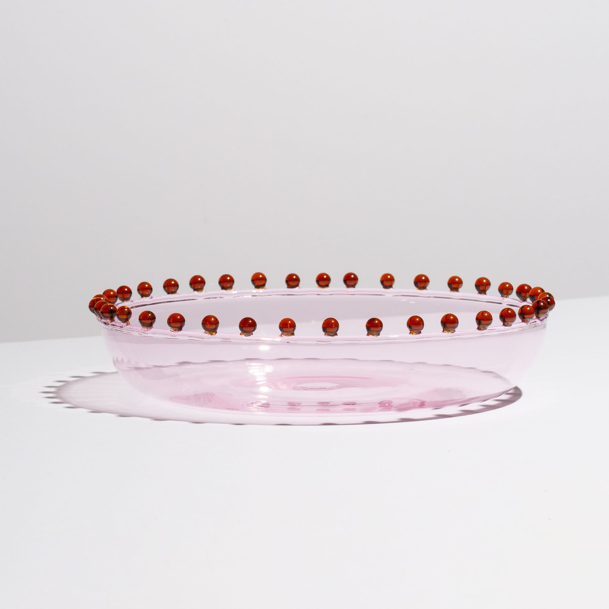 The shape lends itself beautifully to sharing all sweet or savoury dishes. Use the Pearl Platter for healthy summer salads, grilled shellfish with lemon, or apple crumble. This delicate piece is made for grown-ups and the fanciest of soirees.