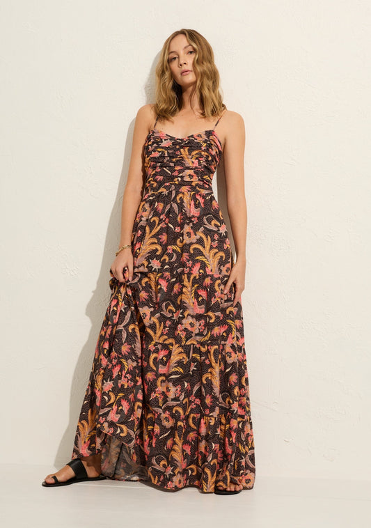The Portia Maxi Dress in our Charcoal Arizona Print features a delicate sweetheart neckline, a fixed gathered bust, a fixed waist, and a voluminous tiered skirt with side pockets, all crafted from 100% textured cotton.  Our studio model Loli is 175cm / 5' 9” and wears a Size S.
