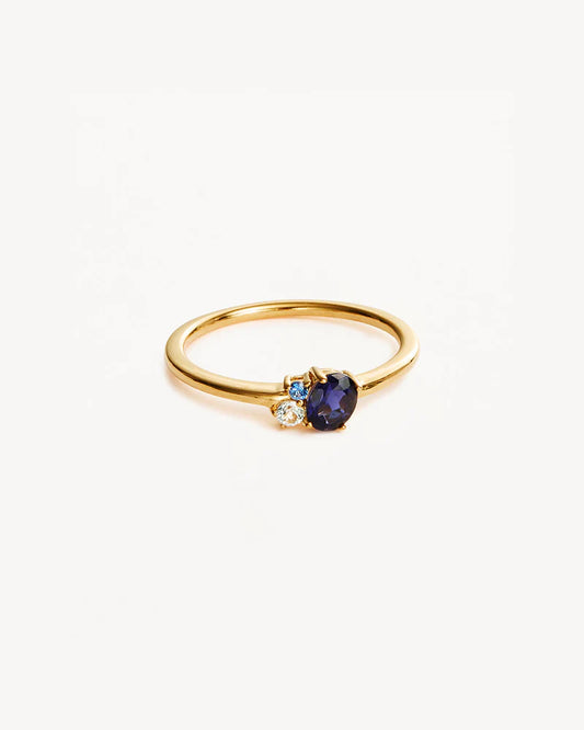Our&nbsp;Gold Kindred September Birthstone Ring&nbsp;features a kaleidoscopic cluster of ethically and sustainably sourced natural iolite, blue topaz, and blue sapphire. The September birthstone, sapphire, is believed to symbolise wisdom, loyalty, and the vast possibilities of the universe, making it a cherished symbol of virtue. This subtle stackable ring mirrors the hues of a rainbow, illuminating the diverse connections that infuse joy into our lives.&nbsp;