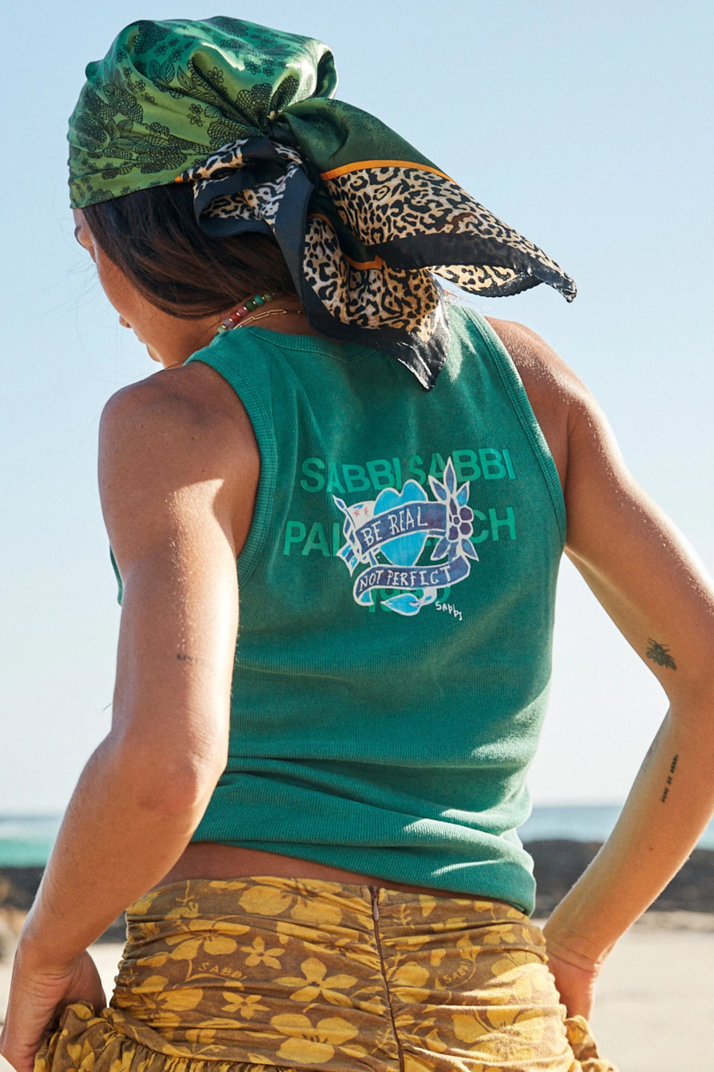 Smooth Sailing Tank - Green

This one's a reminder to slow down and trust where you're headed.&nbsp;🧭

The Smooth Sailing Tank in green is a feel-good staple made for sun-soaked days and slow moments by the sea. Ribbed, easy and effortlessly wearable, it carries that familiar Sabbi reminder that you're enough.

Cut in a classic tank silhouette, this piece features our Smooth Sailing artwork front and back, paired with a soft ribbed cotton fabrication that hugs comfortably without feeling tight. T