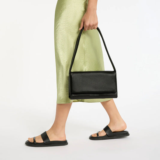 Elysian means "being of such surpassing excellence as to suggest inspiration by the gods." Though not inspired by divinity,