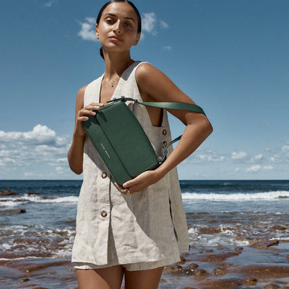 If you're looking for a hands-free, effortless sling on the shoulder bag... 'Figure You Out' is your gal. With enough room to carry all your essentials including any wallet in our collection, and the fancy magnet close flap will have you opening and closing your new fancy shoulder bag just for the hell of it.
