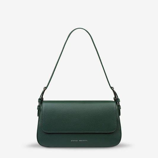If you're looking for a hands-free, effortless sling on the shoulder bag... 'Figure You Out' is your gal. With enough room to carry all your essentials including any wallet in our collection, and the fancy magnet close flap will have you opening and closing your new fancy shoulder bag just for the hell of it.