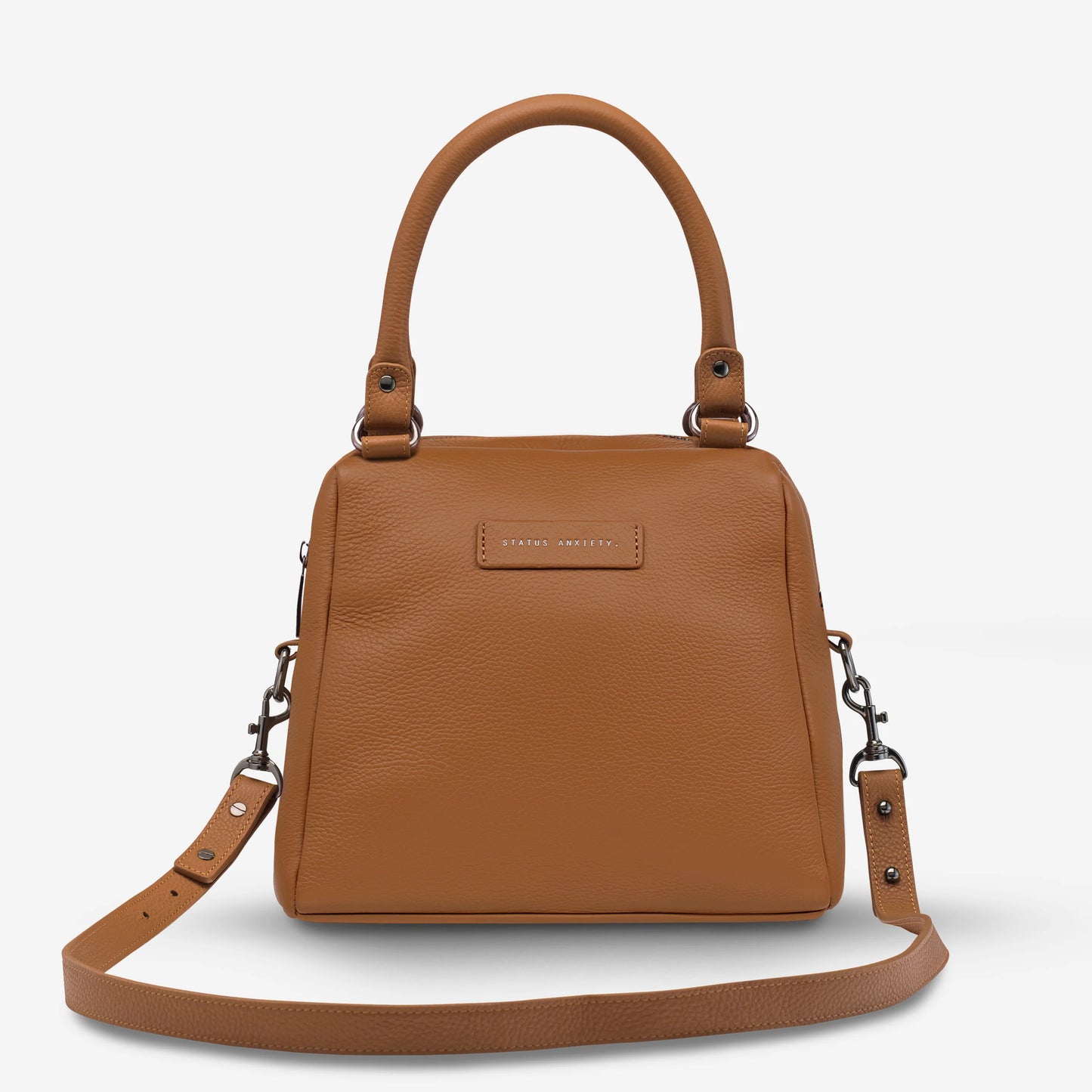 The final assault to end it, to prevail over the proclivity to someone or something. The Last Mountains handbag with its taller silhouette is the perfect day to night companion and can be worn over elbow, shoulder or body (with long strap). Features a wide-opening main compartment, longer shoulder straps for added comfort and secret magnet-close pocket on the outside for your phone etc.

Soft shrunken pebble leather
Custom Status Anxiety lining
Back magnet pocket
Internal zipper pocket, and open pouch pocke
