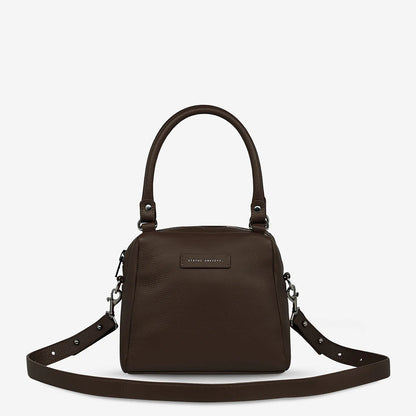 Good things come in small packages. Mini Mountains is a more compact version of the iconic Last Mountains bag. This day to night companion can be worn on elbow, shoulder, or cross body (with included long strap). Features a wide-opening main compartment, longer shoulder strap for added comfort, and secret magnet-close pocket on the outside for your phone etc.

Soft shrunken pebble leather
Custom Status Anxiety lining
Back magnet pocket
Internal zipper pocket, and open pockets
Zipper close
Comes in a Status 