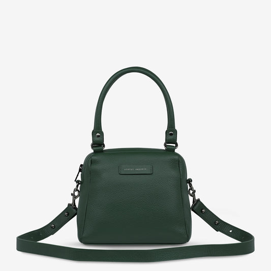 Good things come in small packages. Mini Mountains is a more compact version of the iconic Last Mountains bag. This day to night companion can be worn on elbow, shoulder, or cross body (with included long strap). Features a wide-opening main compartment, longer shoulder strap for added comfort, and secret magnet-close pocket on the outside for your phone etc.

Soft shrunken pebble leather
Custom Status Anxiety lining
Back magnet pocket
Internal zipper pocket, and open pockets
Zipper close
Comes in a Status 