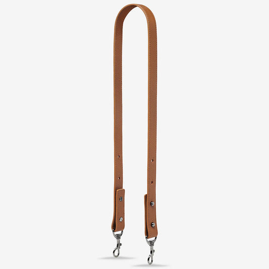 Leather Strap Medium - Camel
Arguably the most important part of a bag, the strap is responsible for keeping it attached to your body but can also change the whole look of your bag. Now sold separately, you can interchange many of our straps to different bag styles across our range.

Soft shrunken pebble leather