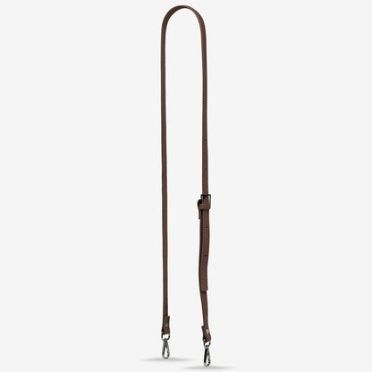 Arguably the most important part of a bag, the strap is responsible for keeping it attached to your body but can also change the whole look of your bag. Now sold separately, you can interchange many of our straps to different bag styles across our range.

Soft shrunken pebble leather
Updated wider strap with custom Status Anxiety branded buckles