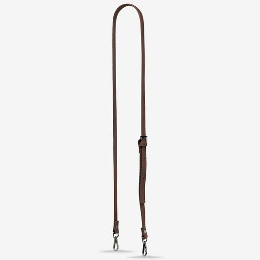 Arguably the most important part of a bag, the strap is responsible for keeping it attached to your body but can also change the whole look of your bag. Now sold separately, you can interchange many of our straps to different bag styles across our range.

Soft shrunken pebble leather
Updated wider strap with custom Status Anxiety branded buckles