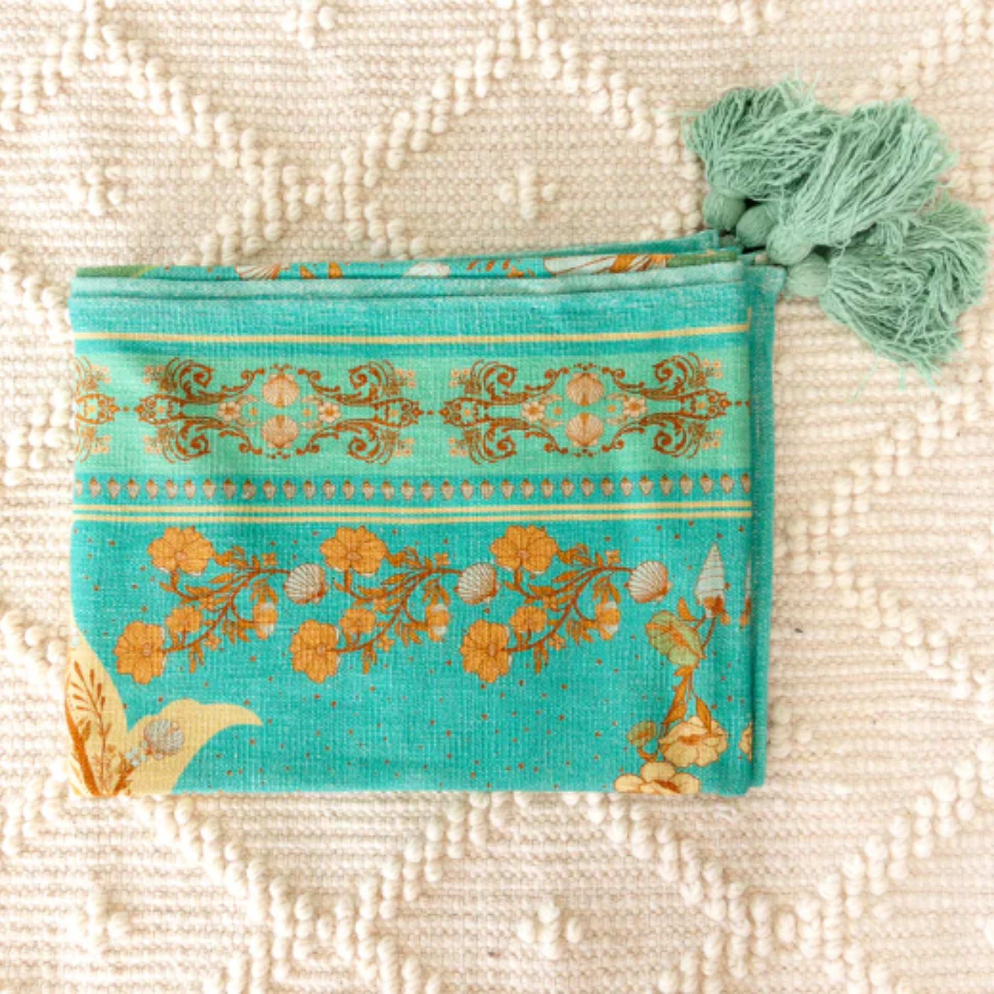 Kailani The Label Oceania Throw Rug in Summer Green & Sea Blue folded